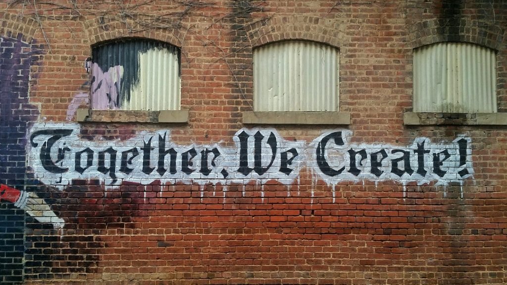 'Together We Create!' graffiti