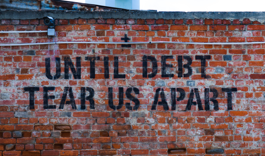 'Until debt tears us apart' street art