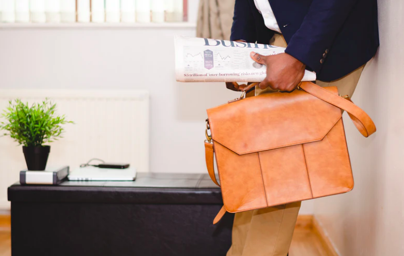 a man holding a briefcase before a job interview