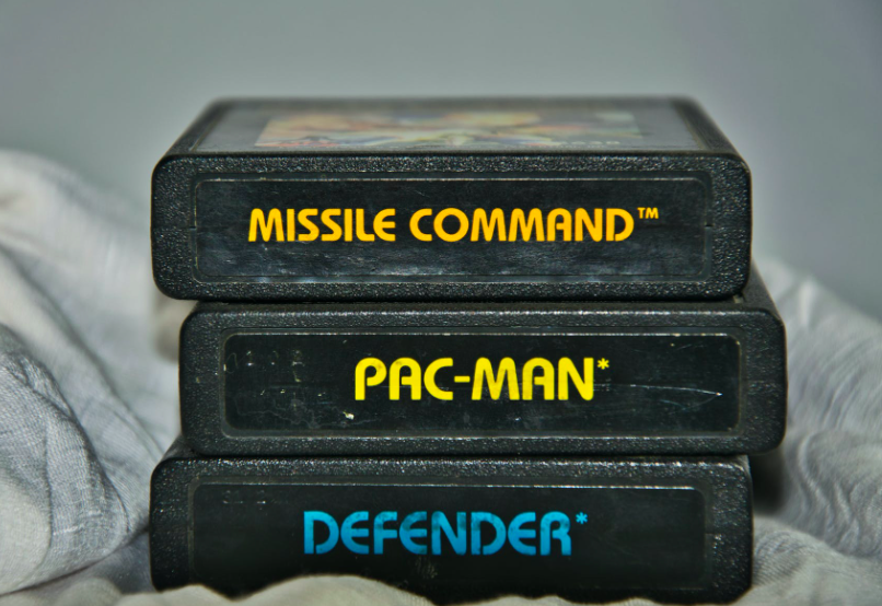 Vintage 80's video games including Pac Man, Missile Command, and Defender