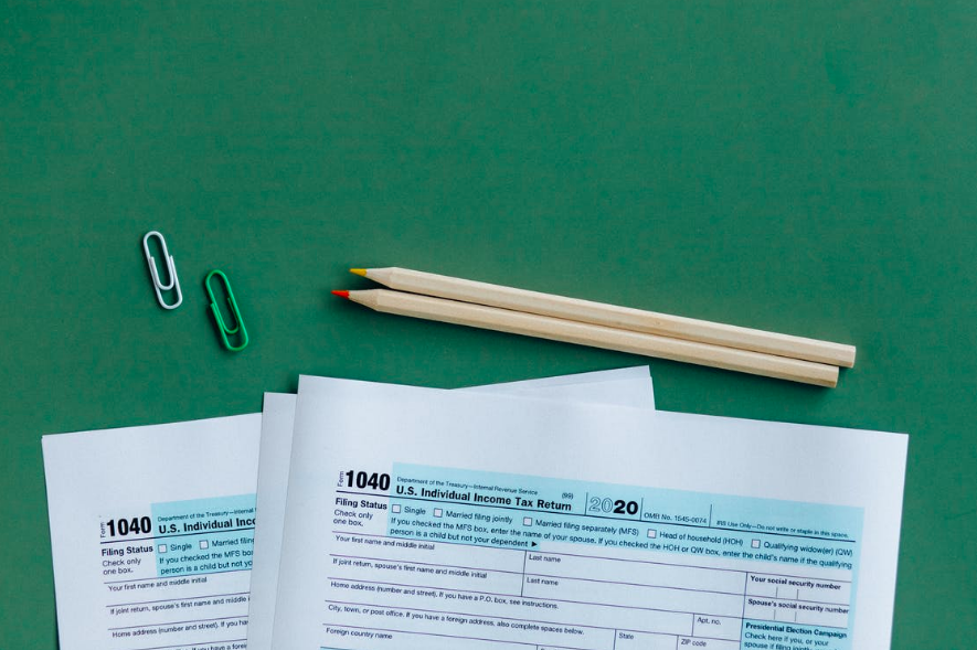 1040 forms and pencils - how to pay less in taxes